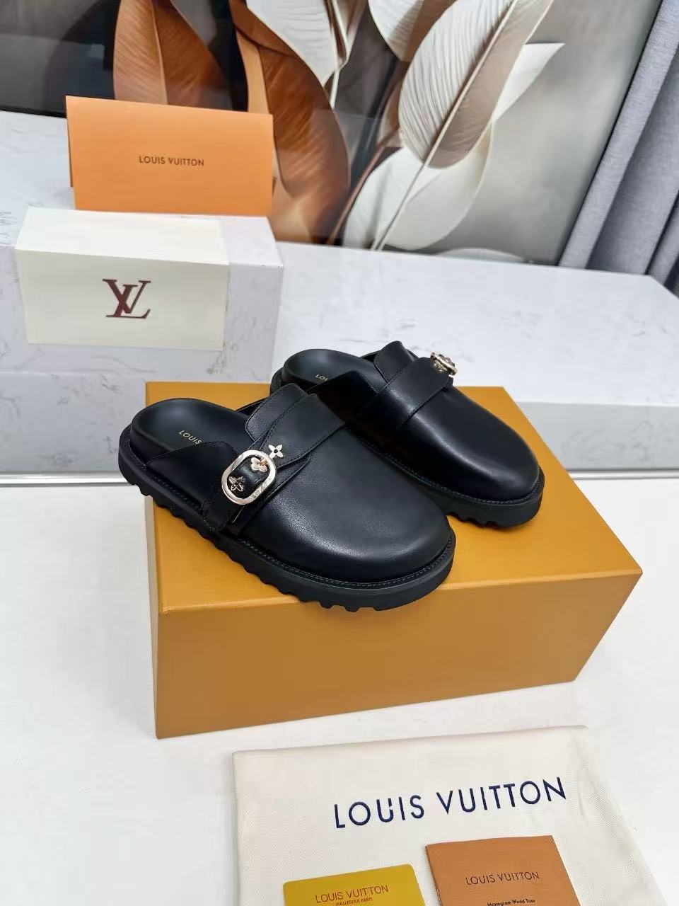 Black leather mule slippers