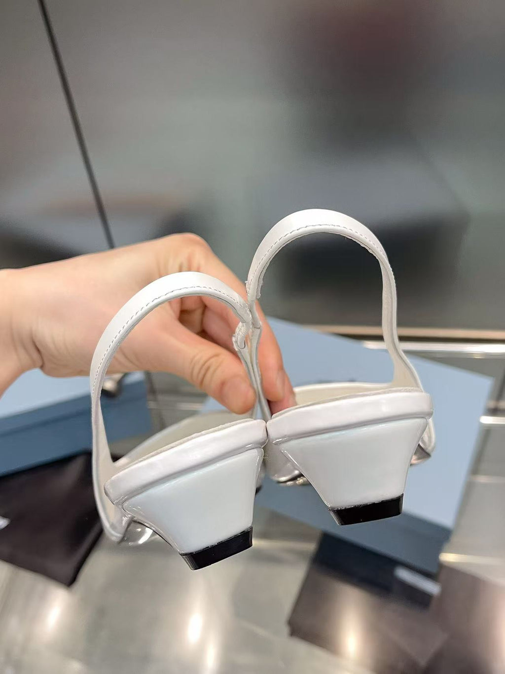 Pointed-toe kitten heel slingback flats