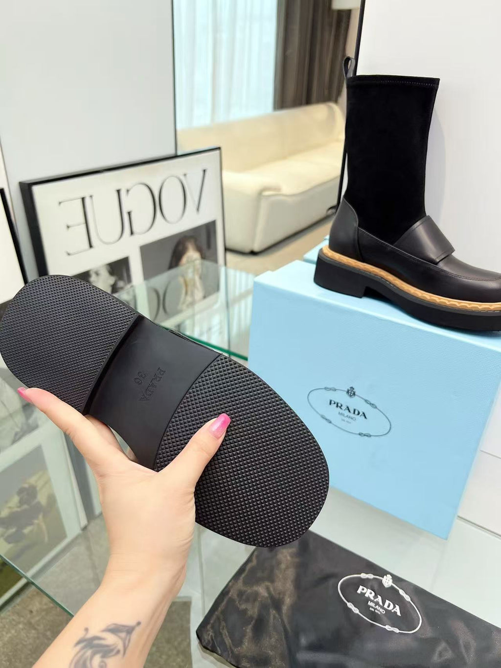 Black patent leather mid-calf boots