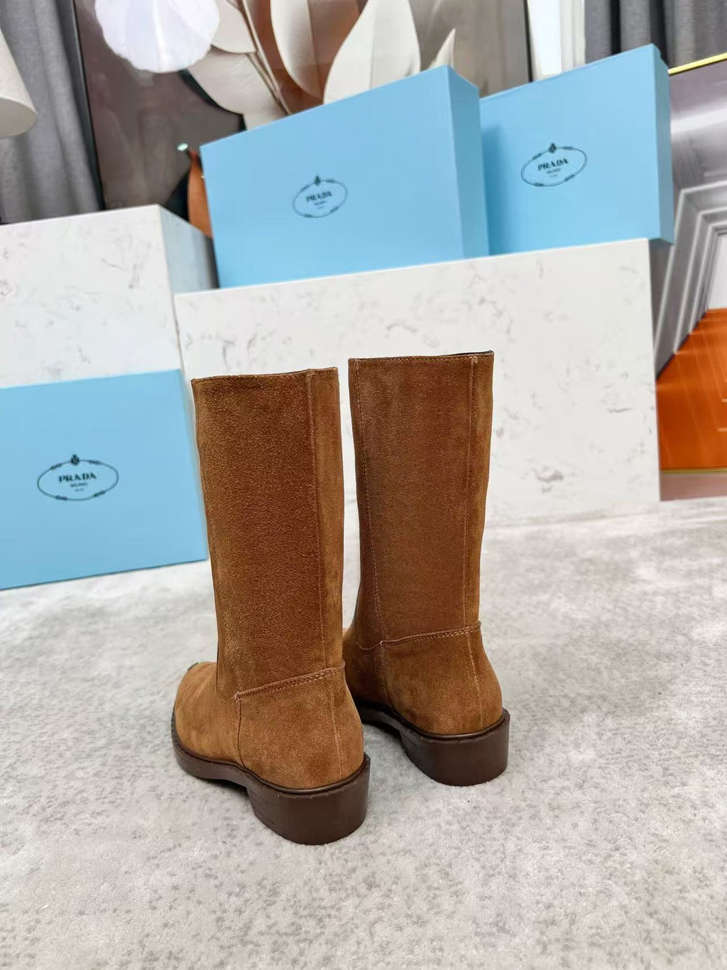 Brown suede mid-calf boots