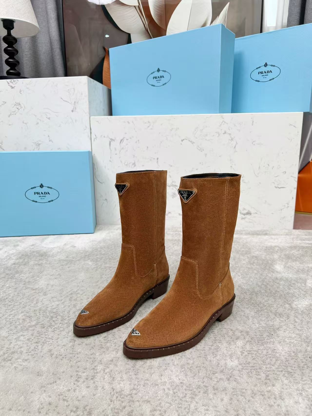 Brown suede mid-calf boots