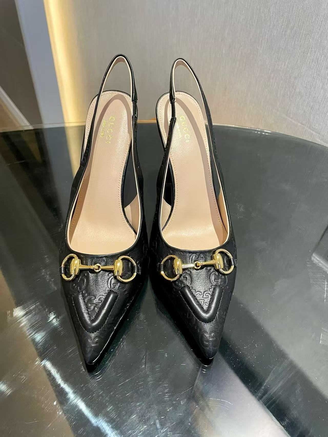 Horsebit pointed toe sandals