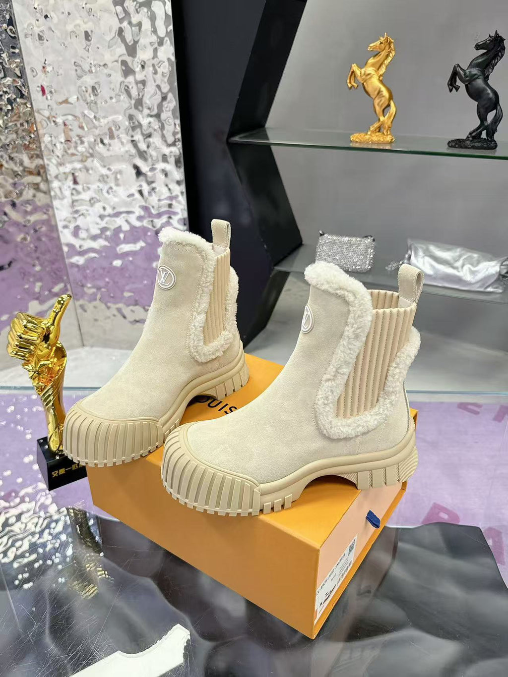 Plush-trimmed Chelsea ankle boots